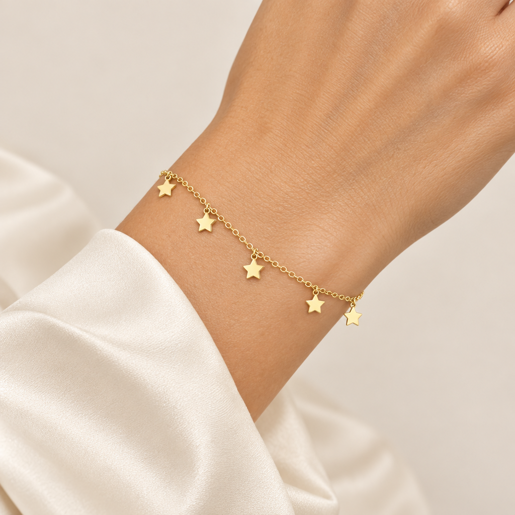 Bracciale 7 stelle pendenti oro giallo 18kt 6mm 19cm indossato
