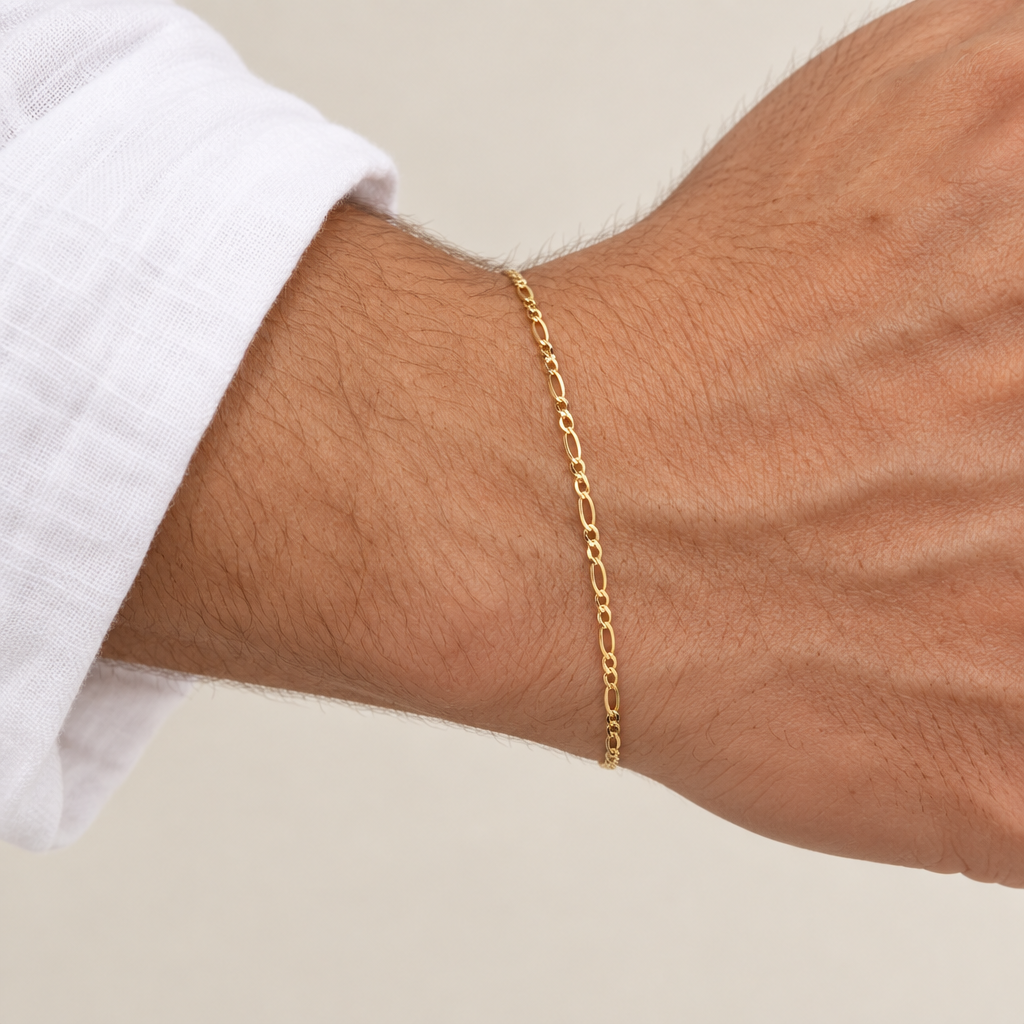Bracciale figaro 3+1 vuoto oro giallo 18kt 3mm 20cm indossato