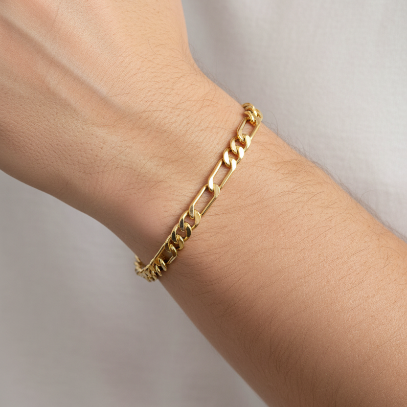 Bracciale figaro 3+1 vuoto oro giallo 18kt 4mm 19cm indossato